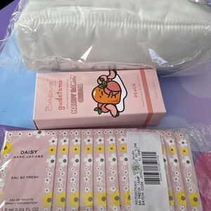 Crème Puffer makeup bag with extras